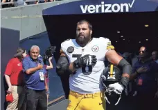  ?? JOE ROBBINS, GETTY IMAGES ?? The Steelers’ Alejandro Villanueva stands by himself in the tunnel for the national anthem before the game against the Bears at Soldier Field.