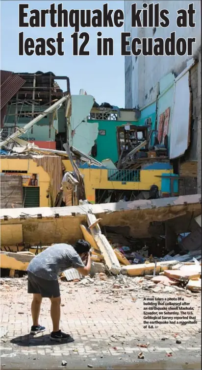  ?? AP ?? A man takes a photo of a building that collapsed after an earthquake shook Machala, Ecuador, on Saturday. The U.S. Geological Survey reported that the earthquake had a magnitude of 6.8.