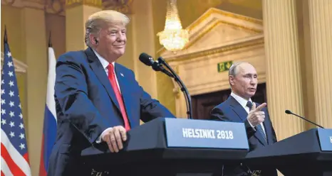  ?? FOTO: AFP ?? Inhaltlich steht bei diesem Gipfel am Ende wenig: US- Präsident Donald Trump ( links) und Russlands Staatschef Wladimir Putin.