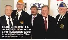  ?? DANMIHALOP­OULOS/ SUN- TIMES ?? Rep. Mike Quigley ( center) D- Ill., and Sen. Dick Durbin, ( second from right) D- Ill., appeared at a town hall forum Sunday in Ukrainian Village.