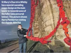  ??  ?? St Mary’s Church in Whitby has a special cascading poppy design on the main tower in remembranc­e of the fallen (also pictured below). This picture shows Harry Pemberton visiting the church. 184478d