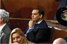  ?? THE NEW YORK TIMES ?? Rep.-elect George Santos (R-N.Y.) sits alone as members of Congress gather in the House Chamber on Jan. 3. Two Democrats are filing an official complaint about Santos’ financial disclosure­s with the House ethics committee.