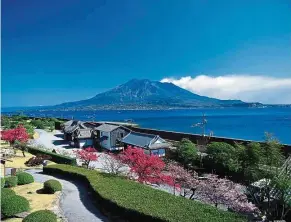  ??  ?? One of the most striking features of the Senganen Garden is its use of Mt Sakurajima and Kagoshima Bay as borrowed scenery.