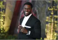  ?? PHOTO BY JORDAN STRAUSS/INVISION/AP, FILE ?? In this Dec. 11, 2017file photo, Kevin Hart arrives at the Los Angeles premiere of “Jumanji: Welcome to the Jungle” in Los Angeles. Hart will host the 2019Academ­y Awards, fulfilling a lifelong dream for the actor-comedian.