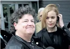  ?? COLIN PERKEL/THE CANADIAN PRESS ?? Retired RCMP officer Linda Davidson (left) and her lawyer Megan McPhee are seen outside Federal Court in Toronto on Wednesday. Davidson was a representa­tive plaintiff in a class-action suit against the RCMP on behalf of sexually harassed female...