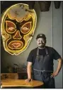  ?? (NWA Democrat-Gazette file photo/Ben Goff) ?? Rafael Rios poses for a photo in June 2020 at Yeyo’s Mexican Grill in Bentonvill­e.