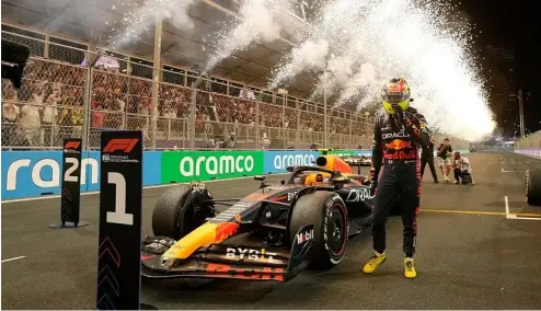  ?? ?? Vehicle for greenwashi­ng? F1 sponsor Saudi Aramco accused of ‘misleading’ fans with e-fuel ads.