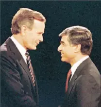  ?? Lennox Mclendon Associated Press ?? IN HIS RACE against Michael Dukakis, George H.W. Bush held to his view of politics as a game played to the death.