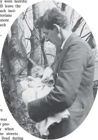  ??  ?? David Bartley, holding his son Jim Bartley (Senior), in the Spring of
1936.