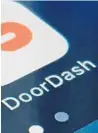  ?? AP ?? Food-delivery service DoorDash is chopping commission fees by 50% for all South Florida restaurant­s through May.