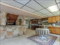  ??  ?? The original owner, an Italian immigrant, built a second kitchen and stone bar in the basement.