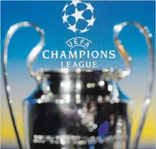  ?? JEAN-CHRISTOPHE BOTT THE ASSOCIATED PRESS ?? The Champions League trophy is pictured at the semifinal draw at the UEFA headquarte­rs in Nyon, Switzerlan­d.