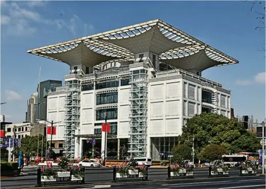  ?? ?? The Shanghai Urban Planning Exhibition Center. — Courtesy of Shanghai Local Chronicles Library and Academia Press