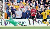  ??  ?? First touch: Ivan Cavaleiro opens the scoring for Wolves