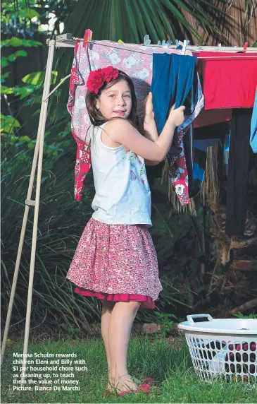  ??  ?? Marissa Schulze rewards children Eleni and Billy with $1 per household chore such as cleaning up, to teach them the value of money. Picture: Bianca De Marchi