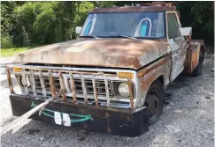  ?? Staff photo by Junius Stone ?? ■ To-Mater— a 1976 tow truck named for a character from the movie “Cars”— is one of the mascots at Pickers Self Service Auto Parts.