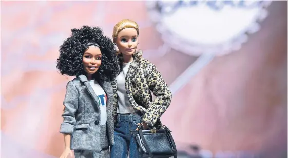  ?? ANGELA WEISS AFP/GETTY IMAGES FILE PHOTO ?? Barbie faces more competitio­n this year when Disney’s Frozen sequel premieres. Mattel lost rights to produce Disney Princess and Frozen dolls to Hasbro in 2014.