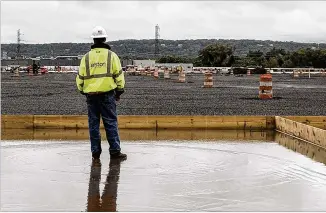  ?? BRYAN ANSELM / THE NEW YORK TIMES ?? Developers are modifying or demolishin­g old factories to meet the growing demand of the logistics business, which covets the large spaces and easy transporta­tion access to move products purchased online.