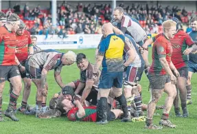  ?? ?? Sam Dawson’s last-minute try secure the crucial win for the home team.