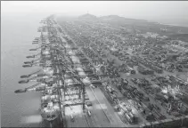  ?? JI HAIXIN / FOR CHINA DAILY ?? An aerial view of Yangshan Deep-Water Port, the world’s largest automated cargo terminal, in Shanghai.