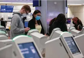  ?? Yi-Chin Lee / Staff photograph­er ?? People check in for flights Friday at George Bush Interconti­nental Airport in Houston. Flight delays have been a regular problem for U.S. airlines this year.