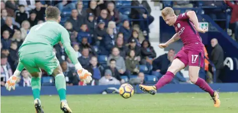  ?? — Reuters ?? Manchester City’s Kevin De Bruyne shoots at goal.