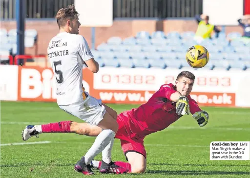  ??  ?? Goal-den boy Livi’s Max Stryjek makes a great save in the 0-0 draw with Dundee