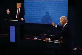  ?? (AP/Morry Gash) ?? In this photo from Sept. 29, 2020, President Donald Trump and Democratic presidenti­al candidate Joe Biden exchange points during their first presidenti­al debate at Case Western University and Cleveland Clinic in Cleveland.