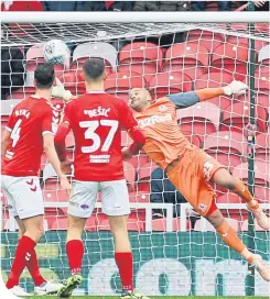  ??  ?? Darren Randolph pulls off another fine save to deny Derby