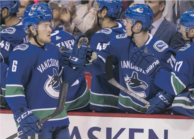  ?? — GETTY IMAGES ?? Brock Boeser celebrates one of his two goals against the Vegas Golden Knights Sunday in NHL pre-season action at Rogers Arena. The Canucks lost 9-4.