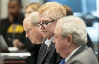  ?? JOSHUA BOUCHER - VIA THE ASSOCIATED PRESS ?? Alex Murdaugh listens as prosecutor Creighton Waters makes closing arguments during his double murder trial at the Colleton County Courthouse on Wednesday in Walterboro, S.C. The 54-year-old attorney faces two counts of murder in the shootings of his wife and son June 7, 2021.