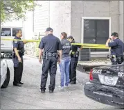  ?? RICARDO B. BRAZZIELL / AMERICAN-STATESMAN ?? Austin police respond to a call about an emotionall­y disturbed person in South Austin early Sunday morning. Police said Micah Jester yelled “shoot me” while pointing a BB gun at them.