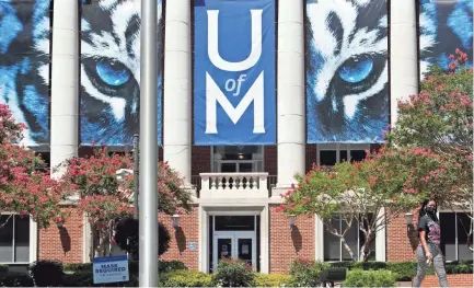  ?? JOE RONDONE/THE COMMERCIAL APPEAL ?? Students return to the University of Memphis campus in August.