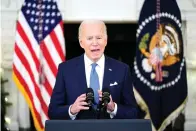  ?? The Associated Press ?? ■ President Joe Biden speaks about the COVID-19 response and vaccinatio­ns on Tuesday in the State Dining Room of the White House in Washington.