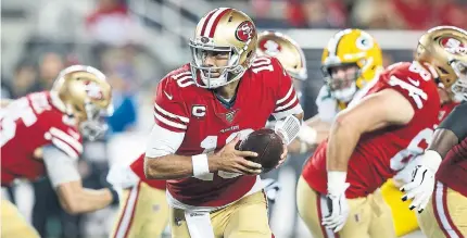  ?? LACHLAN CUNNINGHAM GETTY IMAGES FILE PHOTO ?? Jimmy Garoppolo will lead the San Francisco 49ers into action against the Green Bay Packers in Sunday’s NFC championsh­ip game.