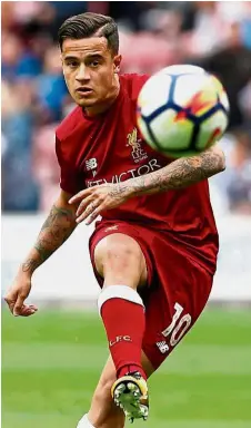 ?? — Reuters ?? Different ball game: Wantaway Philippe Coutinho is playing a waiting game as Liverpool stand firm.