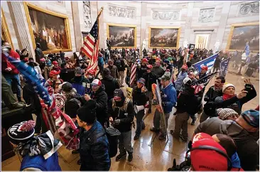  ??  ?? MOB RULE: Supporters of President Trump stormed the Capitol Building forcing a lockdown