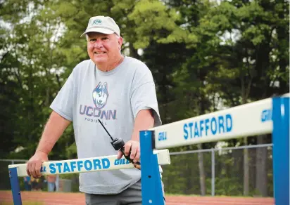  ?? STAN GODLEWSKI/SPECIAL TO THE COURANT PHOTOS ?? Mark Dunn has coached a variety of sports at Stafford High School for 50 years.