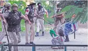  ??  ?? Security forces clash with followers of Gurmeet Ram Rahim Singh in Panchkula, Haryana on August 25, 2017