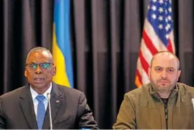  ?? AP PHOTO/MICHAEL PROBST ?? U.S. Defense Secretary Lloyd Austin, left, flanked by Ukrainian Defence Minister Rustem Umerov, speaks Tuesday at the beginning of the meeting of the Ukraine Defense Contact Group at Ramstein Air Base in Ramstein, Germany.