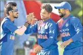  ?? AFP ?? Kuldeep Yadav (centre) had figures of 5/24 on Tuesday.