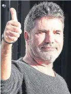  ??  ?? Cowell returns home from hospital