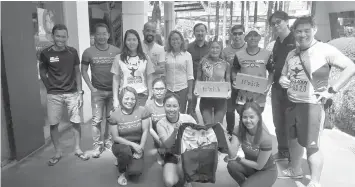  ??  ?? The organizers of Consolacio­n Mountain Bike Duathlon 3.0 slated on March 3 at SM CityConsol­acion led by fitness ambassador Alan G. Choachuy (standing, R) and race course designer Fritz Co pose during a press conference to drum up the event yesterday at Ramen Dojo in Cebu IT Park. MANNY VILLARUEL