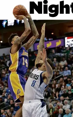  ?? —AFP ?? Brandon Ingram of the LA Lakers takes aim against Deron Williams of the Dallas Mavericks.
