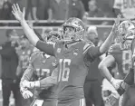  ?? ERIC SEALS/DETROIT FREE PRESS ?? Jared Goff celebrates during the Lions’ wild-card playoff win over the Rams.