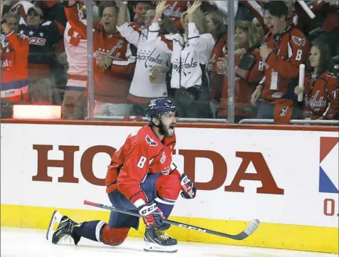  ??  ?? Washington’s Alex Ovechkin celebrates his goal that put the Capitals up 1-0 on Vegas in the second period of Game 3.