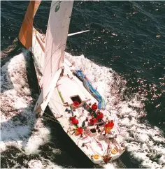  ??  ?? Left: hanging off the stern to jury rig a rudder. Right: the crew are in good spirits with their jury-rigged rudder 30 miles south-west of the Isles of Scilly and on their way to the Whitbread race finish