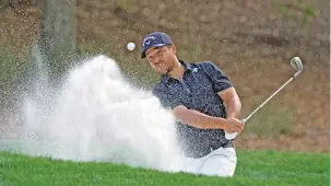  ?? LYNNE SLADKY/THE ASSOCIATED PRESS ?? Xander Schauffele blasts from the sand on the eighth hole Saturday at The Players Championsh­ip in Ponte Vedra Beach, Fla. He held a one-shot lead heading into Sunday’s final round.