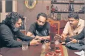  ??  ?? John with Fahadh Faasil and a crew member on the sets of Irul.