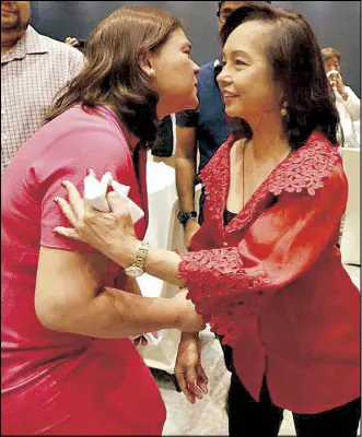  ?? PHOTO FROM THE OFFICE OF THE HOUSE SPEAKER ?? Speaker Gloria Macapagal-Arroyo greets Davao City Mayor Sara Duterte during a ‘thank you’ lunch for lawmakers at a hotel in Quezon City yesterday.